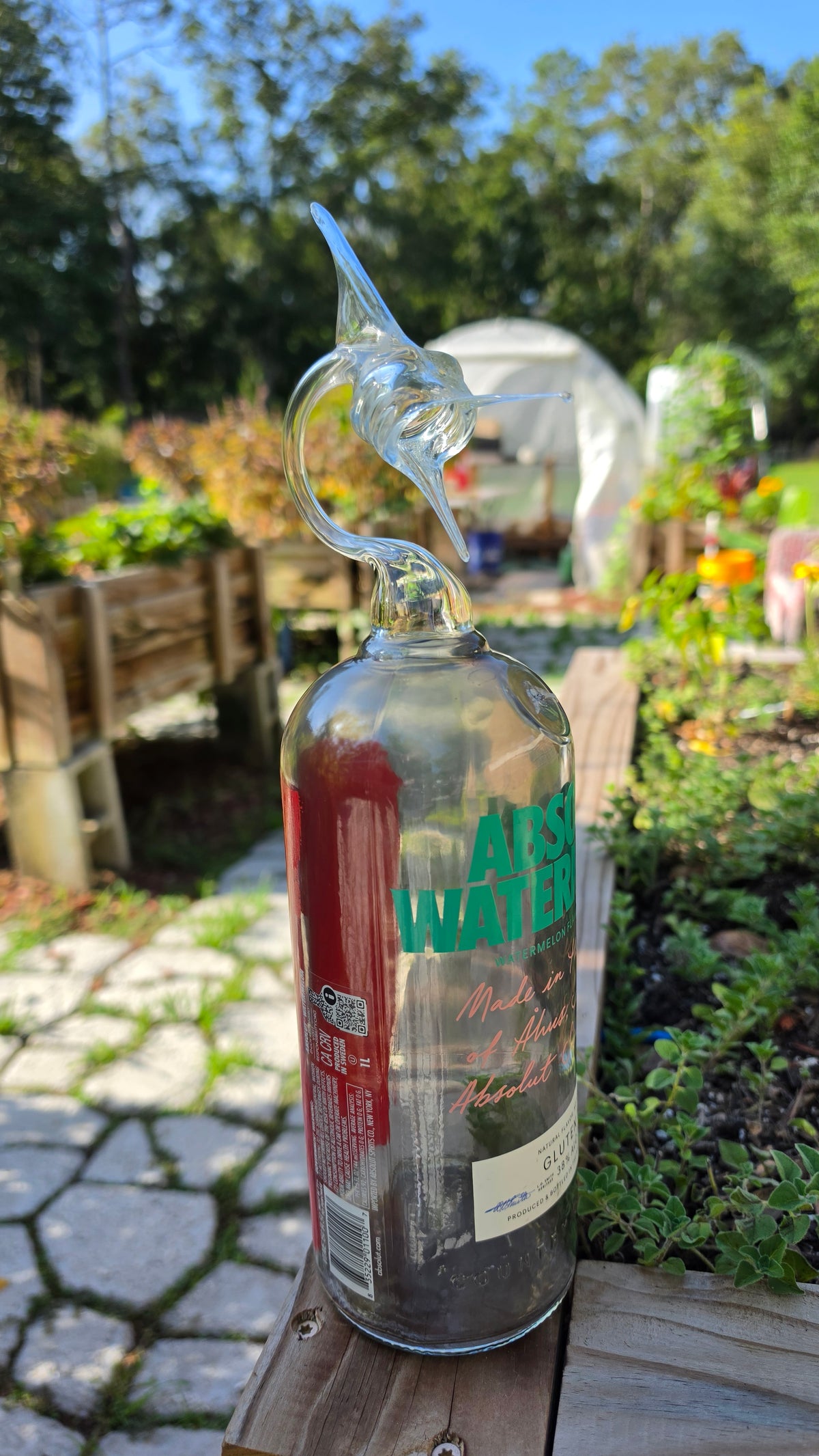 Warm Toned Glass Marlin Bottle Sculpture – Handcrafted Vibrant Art