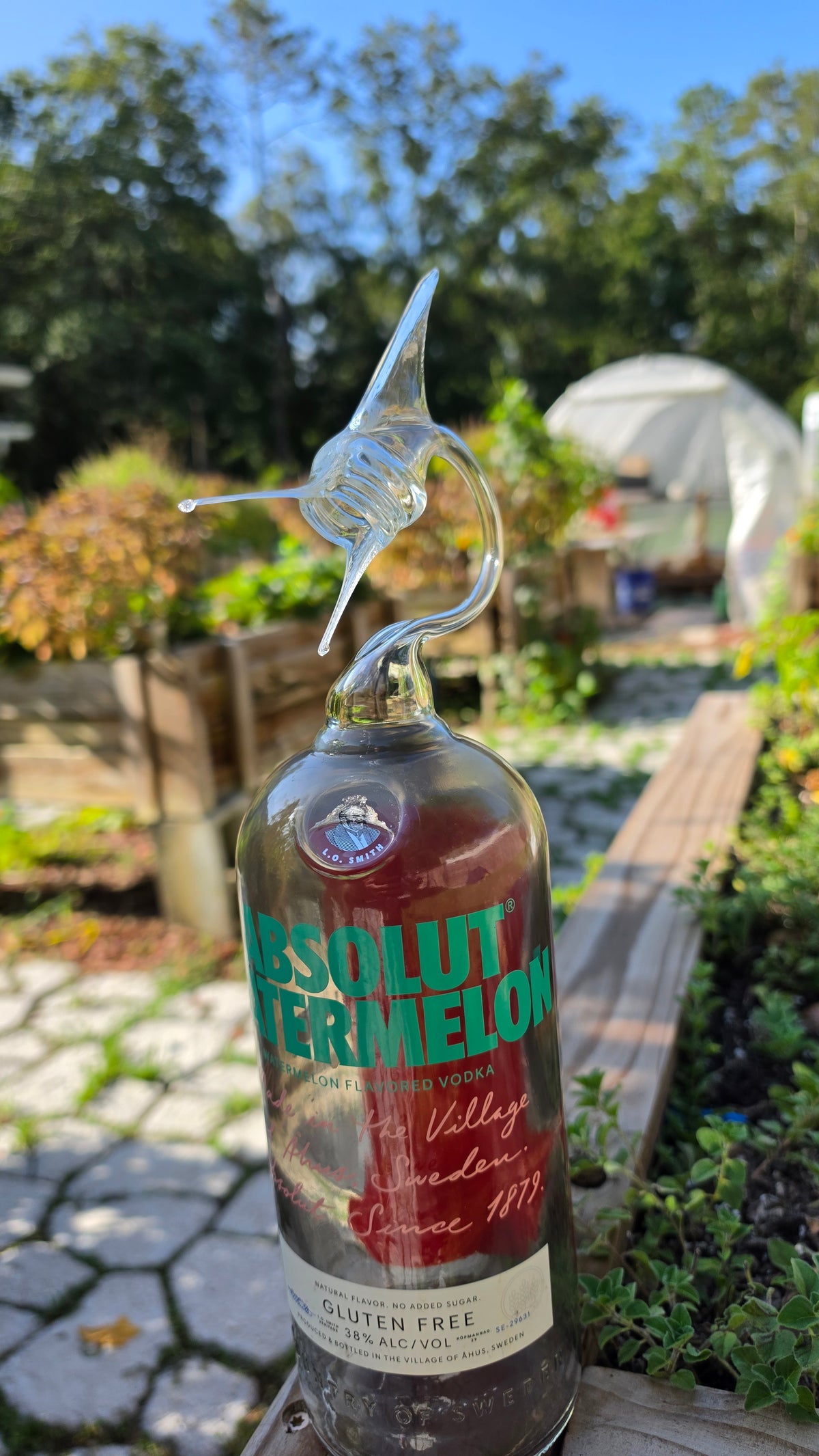 Warm Toned Glass Marlin Bottle Sculpture – Handcrafted Vibrant Art
