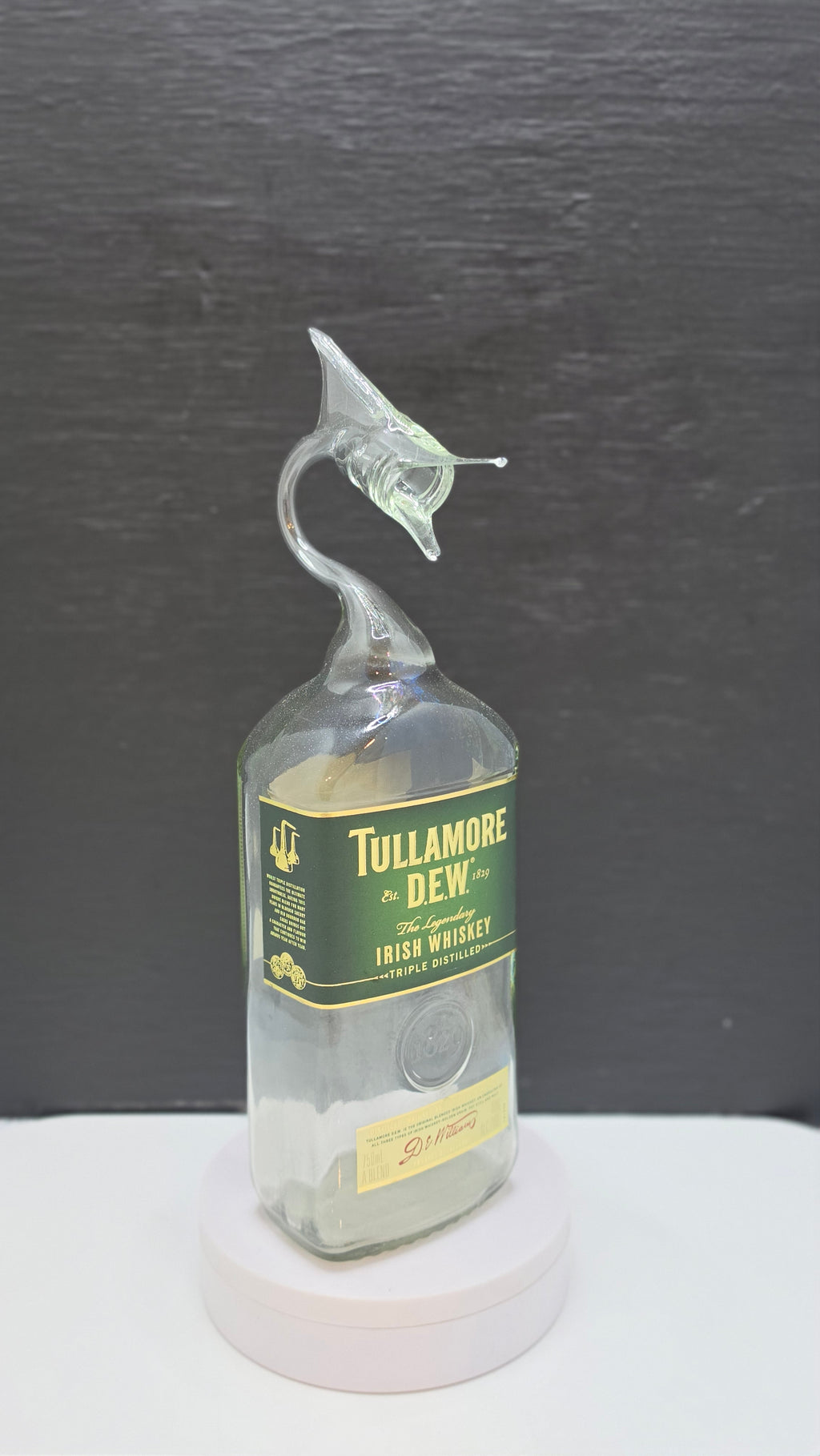 Dark Glass Marlin Bottle Sculpture – Handcrafted Decorative Art