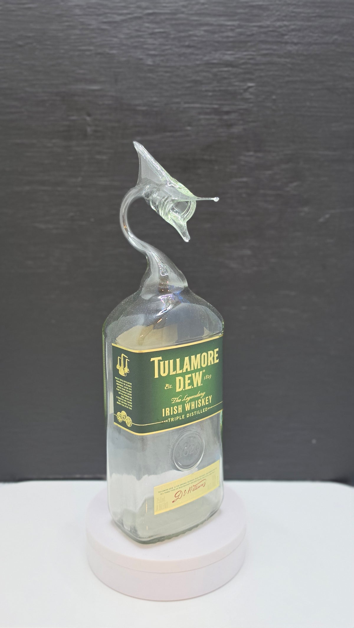Dark Glass Marlin Bottle Sculpture – Handcrafted Decorative Art