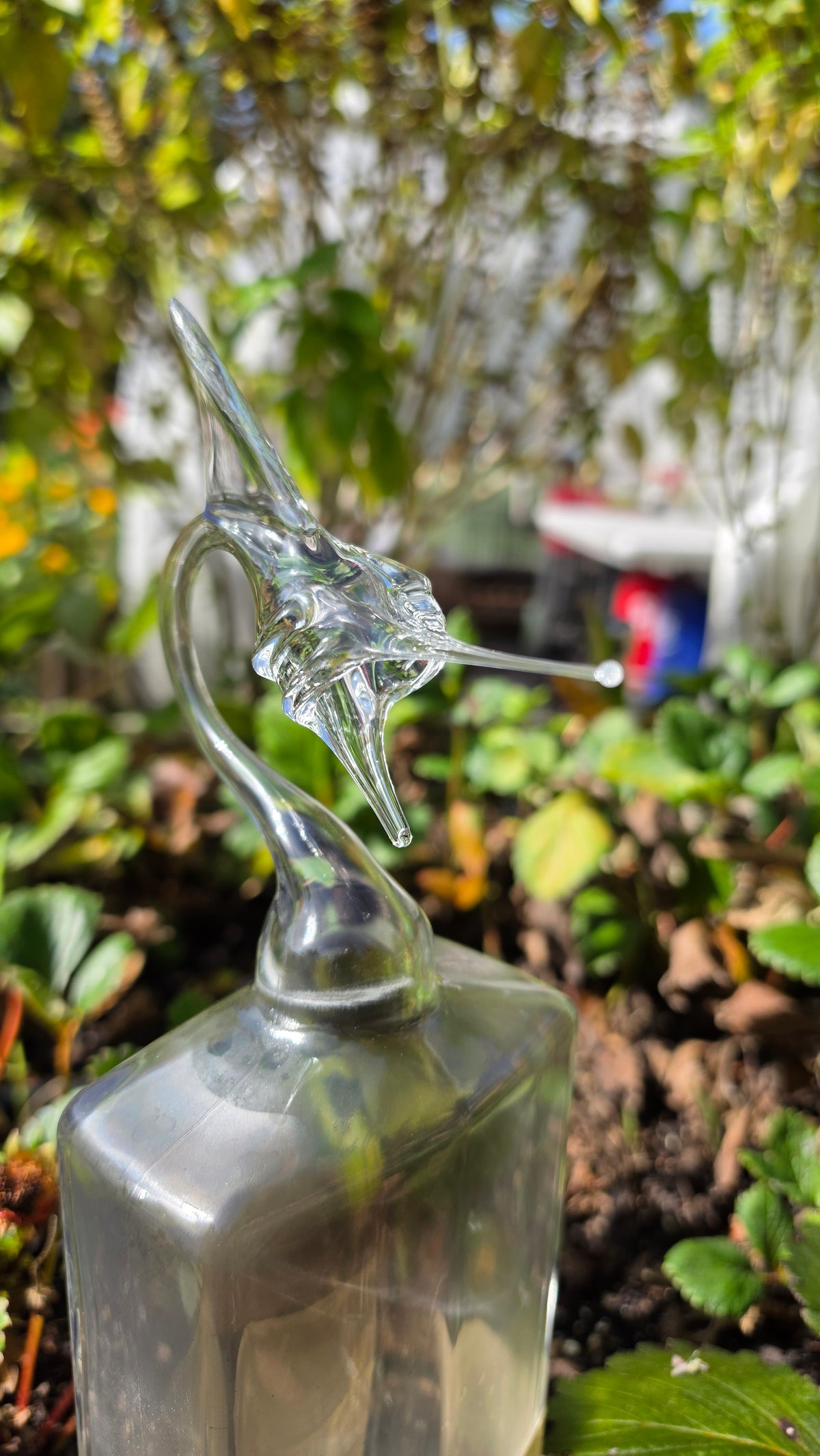 Deep Obsidian Glass Marlin Bottle Sculpture – Handcrafted Deep-Sea Art