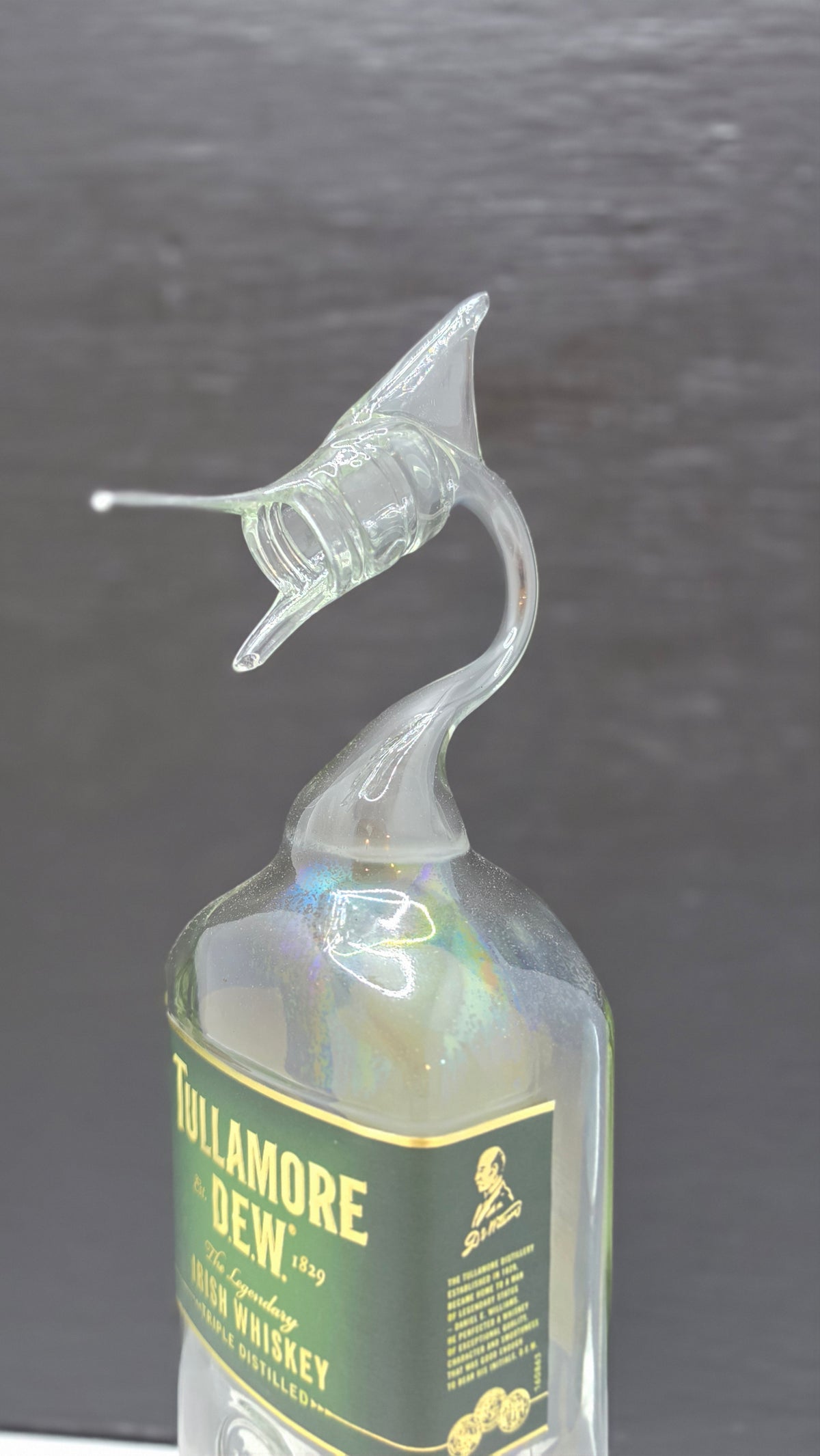 Dark Glass Marlin Bottle Sculpture – Handcrafted Decorative Art