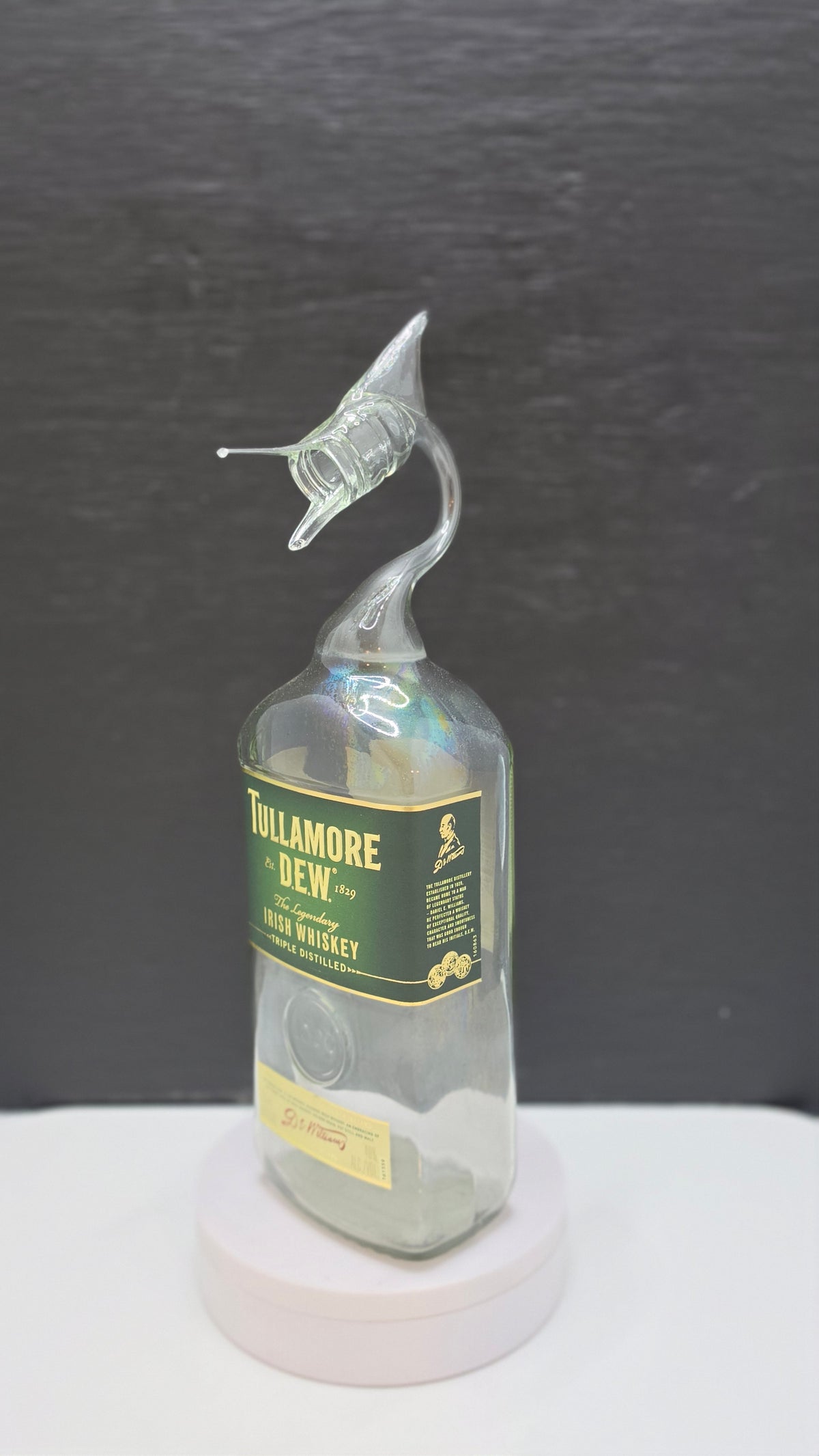 Dark Glass Marlin Bottle Sculpture – Handcrafted Decorative Art